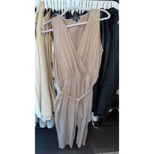 Express jumpsuit in nude/pink. Super soft and silky fabric.